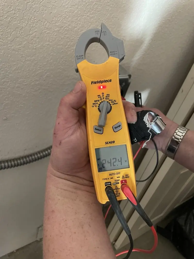 Voltage testing with clamp meter during Hot Tub / Pool Electrical Wiring in Buffalo Grove